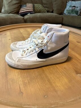 Nike White High-Top Sneakers with Black Swoosh